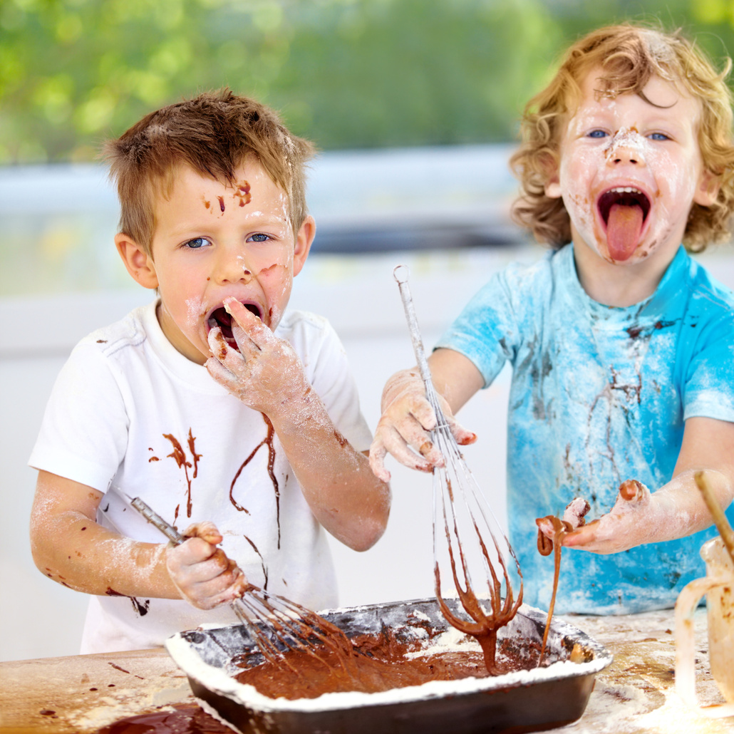 Kids Will Be Kids. Shot of Two Messy Little Boys Trying to Make